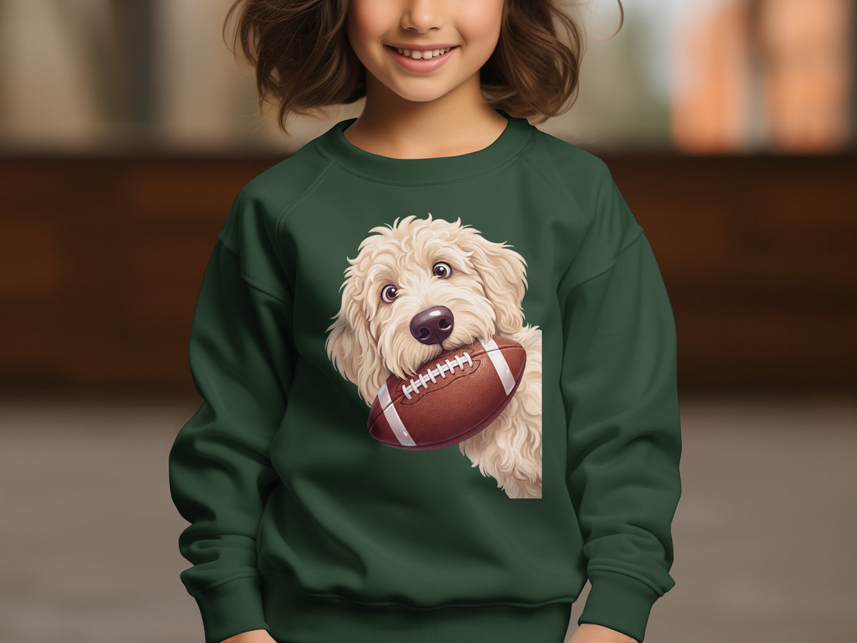 Green sweatshirt with a cream doodle dog holding a football.