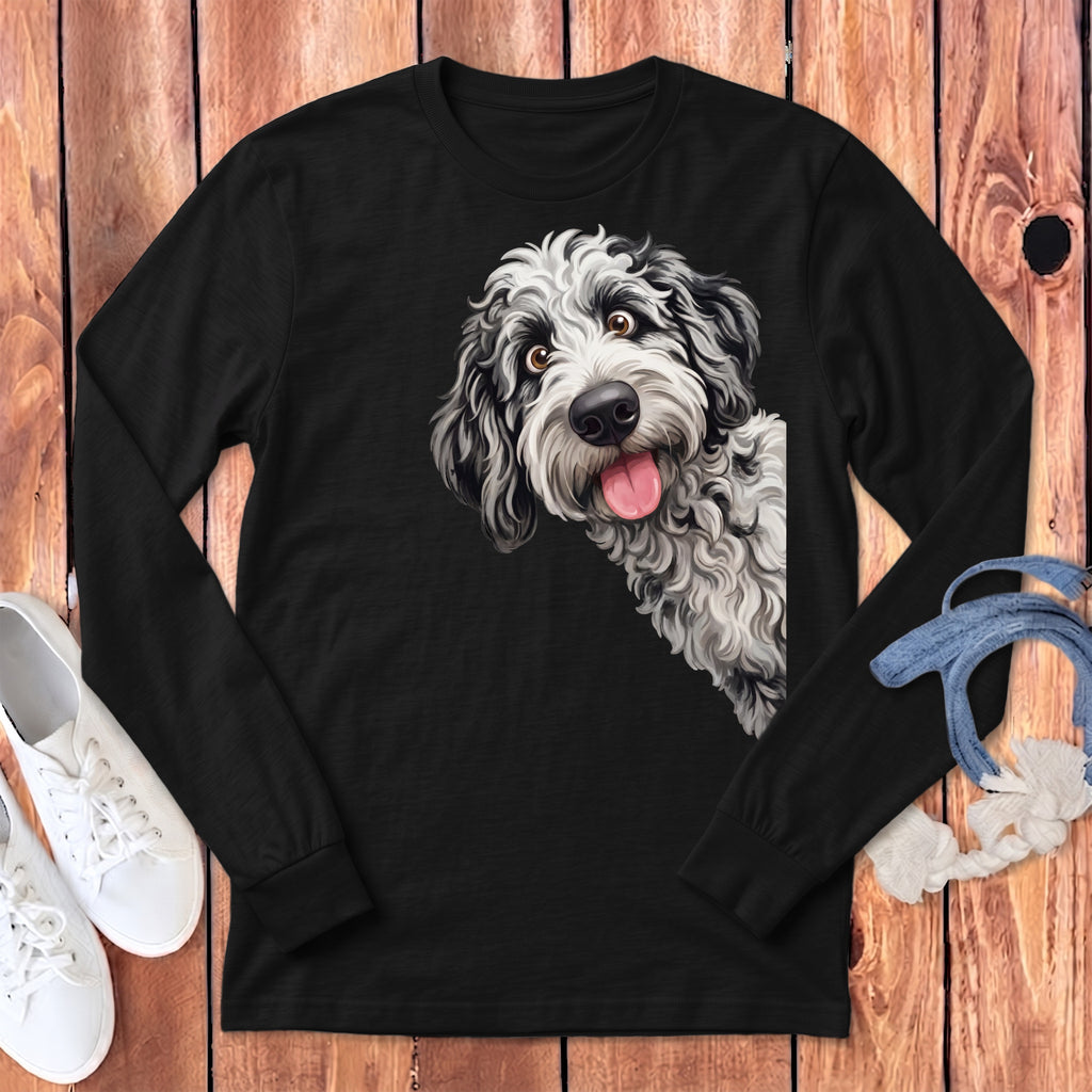 Black long-sleeve shirt with a playful black and white dog graphic on the left chest.