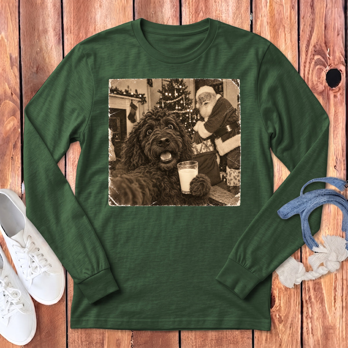 Dark green long-sleeve shirt with a graphic of a dog holding a glass of milk near Santa.