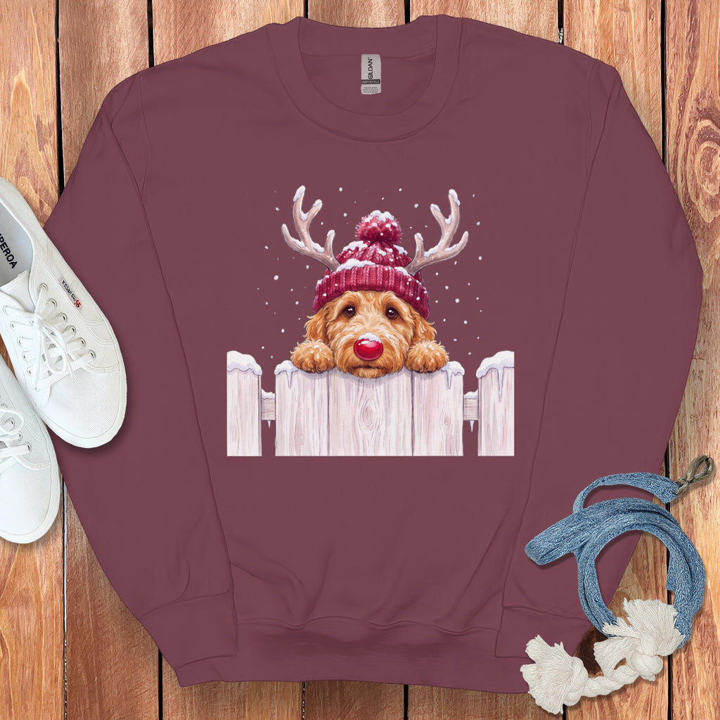 Maroon sweatshirt with a cute doodle dog wearing a Santa hat and antlers.