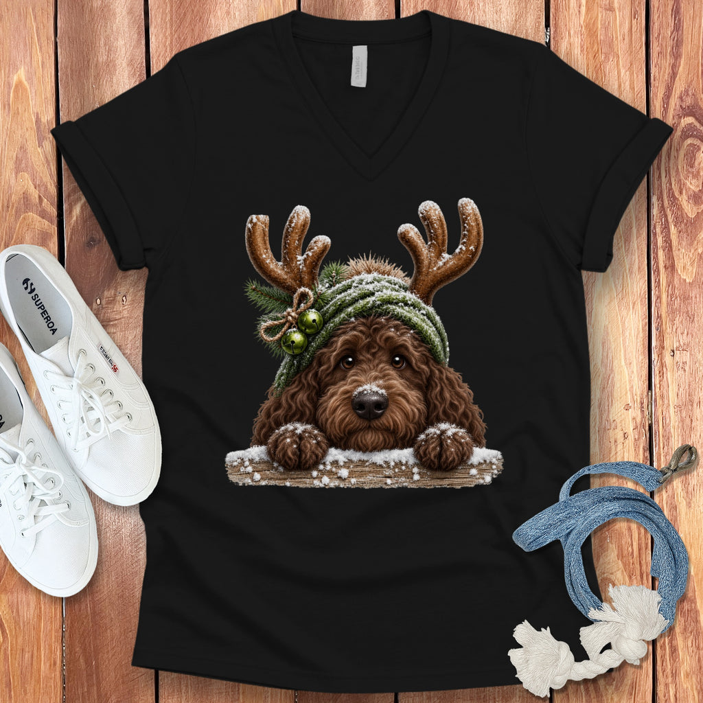 Black t-shirt featuring a brown dog with reindeer antlers and winter hat.