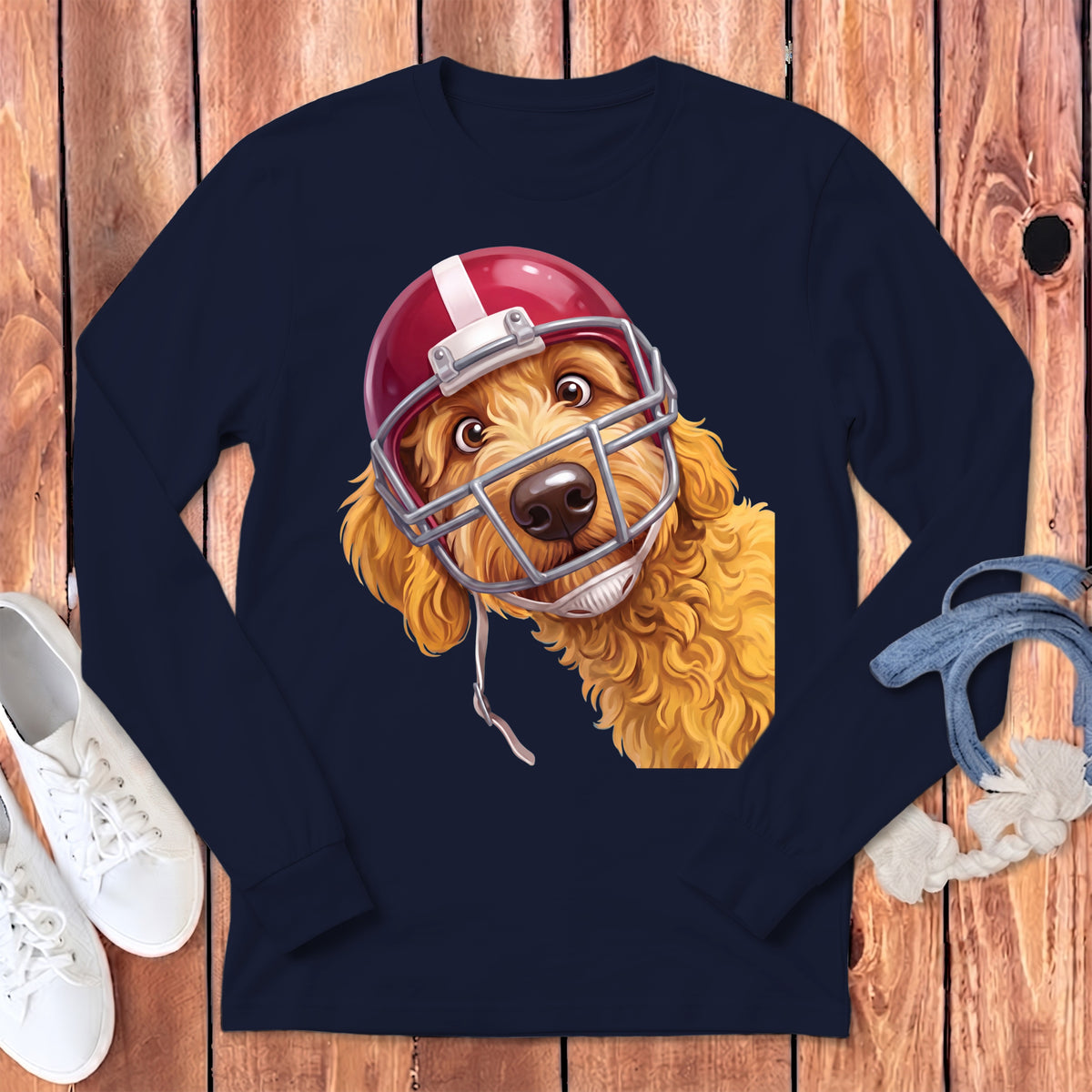 Golden doodle dog wearing a red and white football helmet.