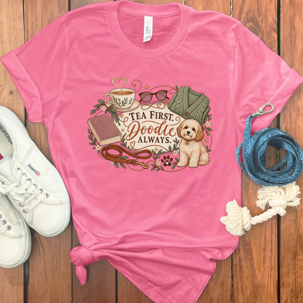 Pink t-shirt with "Tea First. Doodle Always." text and a doodle dog graphic.