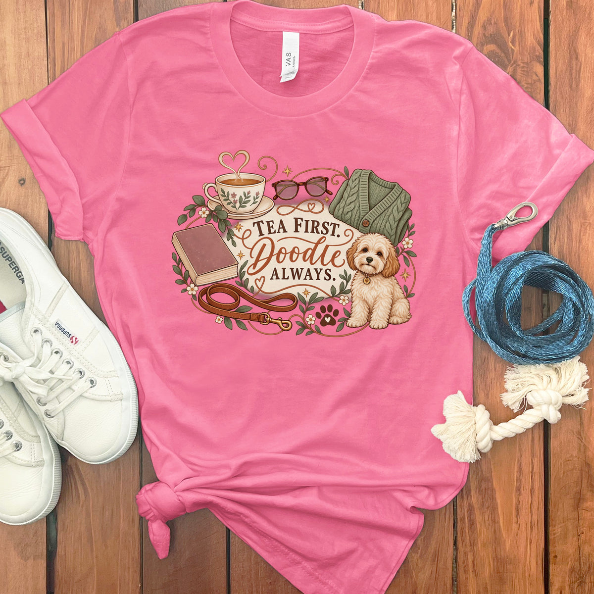 Pink t-shirt with "Tea First. Doodle Always." text and a doodle dog graphic.