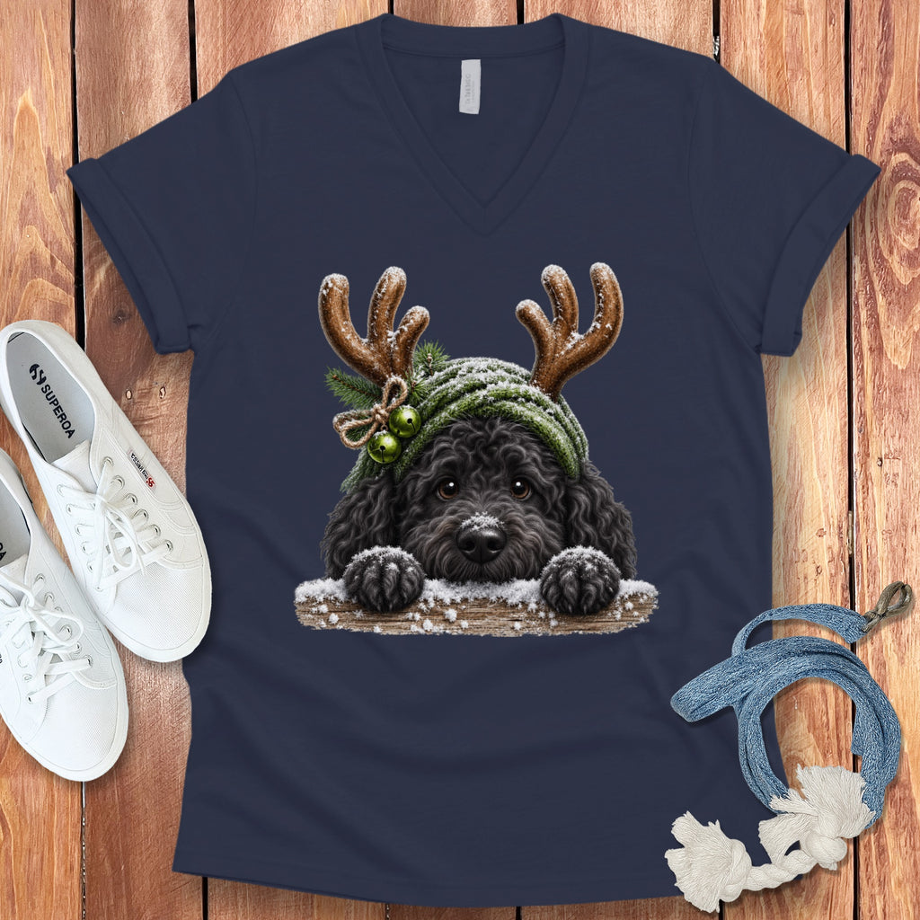 Black dog with antlers and green hat on navy t-shirt.