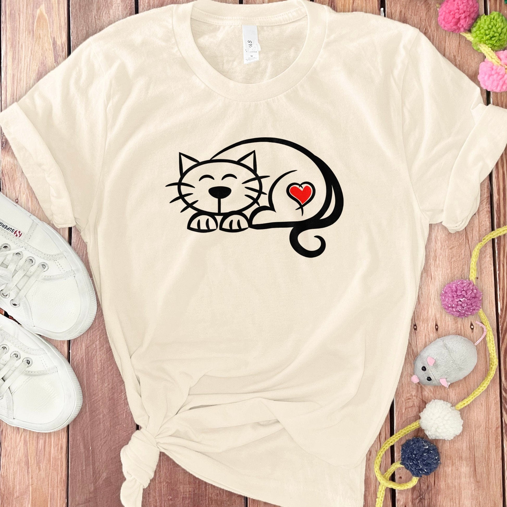 Cute Sleeping Cat with Heart Graphic T-Shirt product type