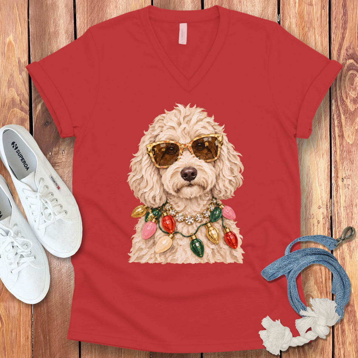 Red v-neck t-shirt with a cartoon dog wearing sunglasses and a string of Christmas lights.