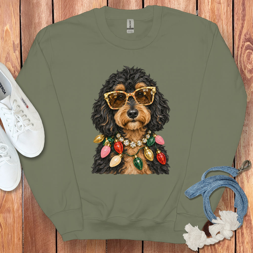 Crewneck sweatshirt with a black and tan dog wearing sunglasses and Christmas lights.