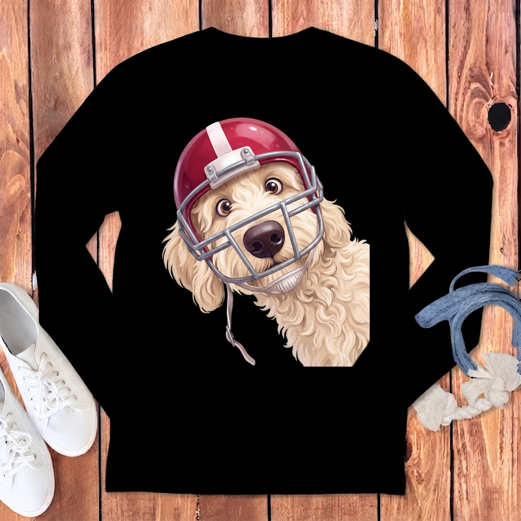 Cream doodle dog wearing a red football helmet and facemask, centered.