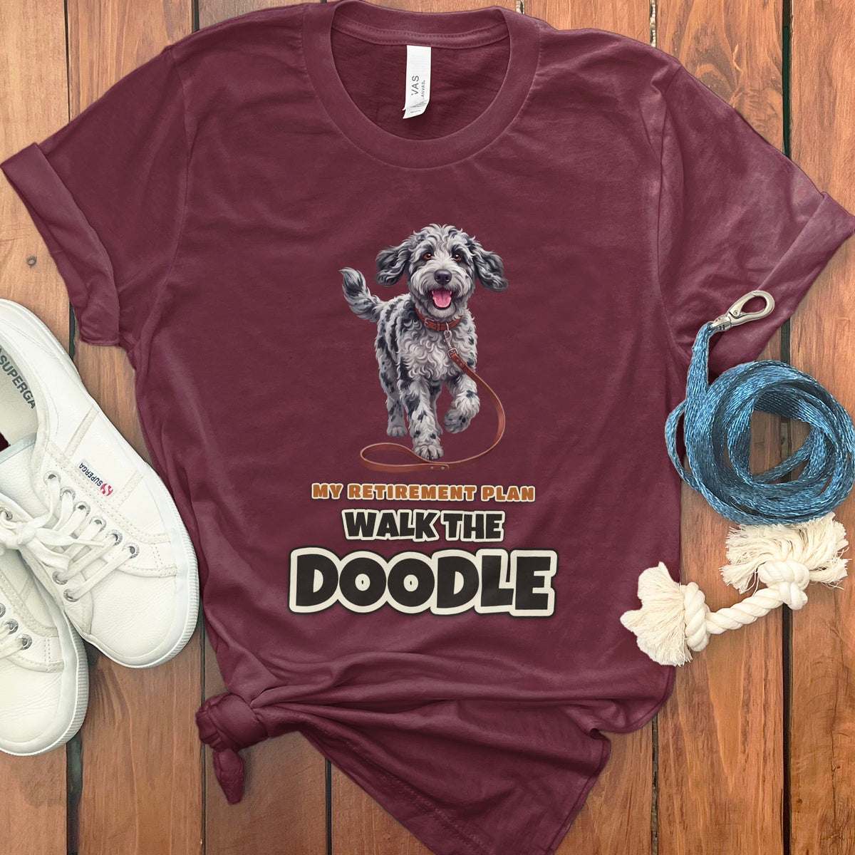 Maroon t-shirt with a doodle dog graphic and text "My Retirement Plan Walk The Doodle".
