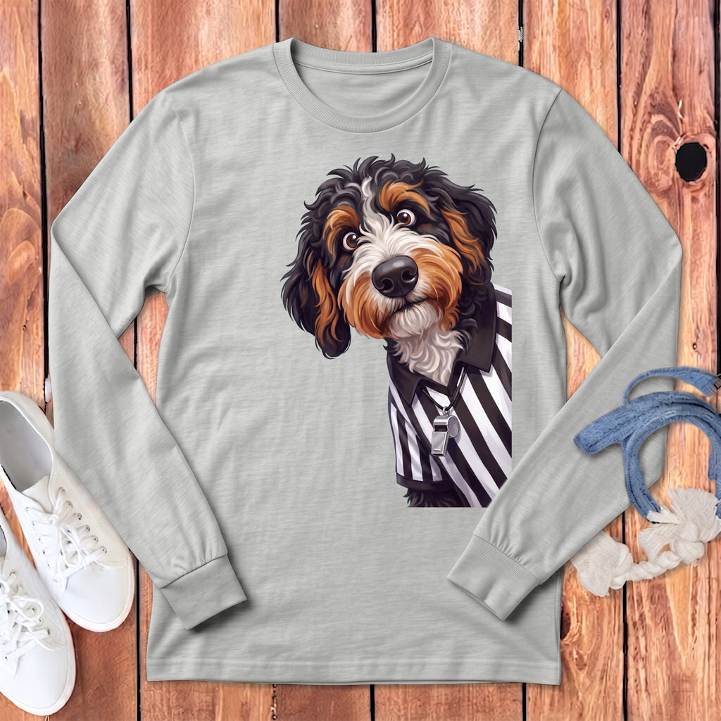 Bernese Mountain Dog wearing a referee shirt with a whistle.