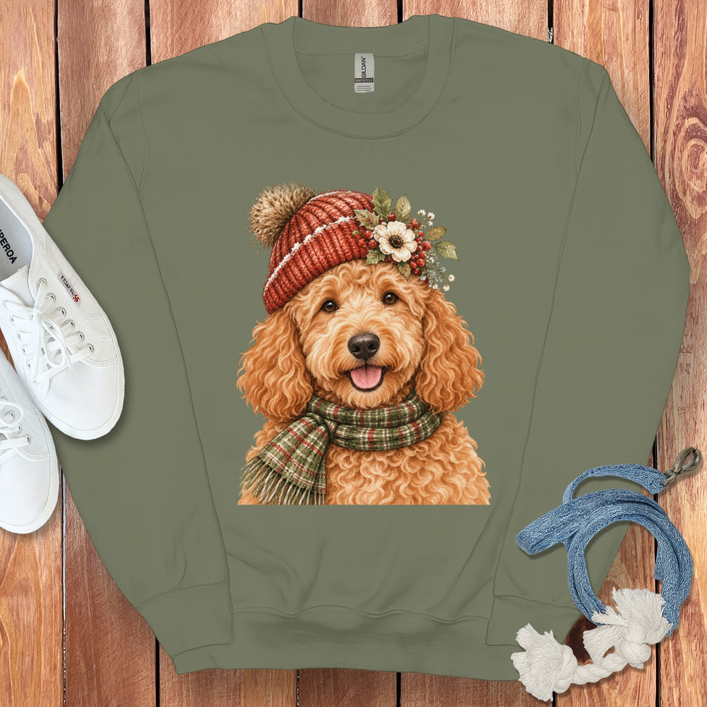 Goldendoodle wearing a knitted hat and scarf with floral accents.
