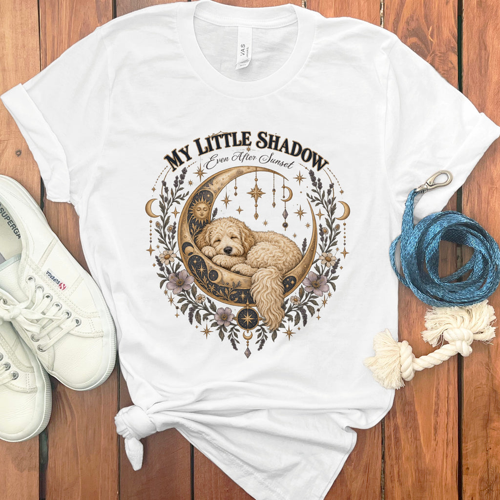 White t-shirt with "My Little Shadow Even After Sunset" text and sleeping dog on moon graphic.