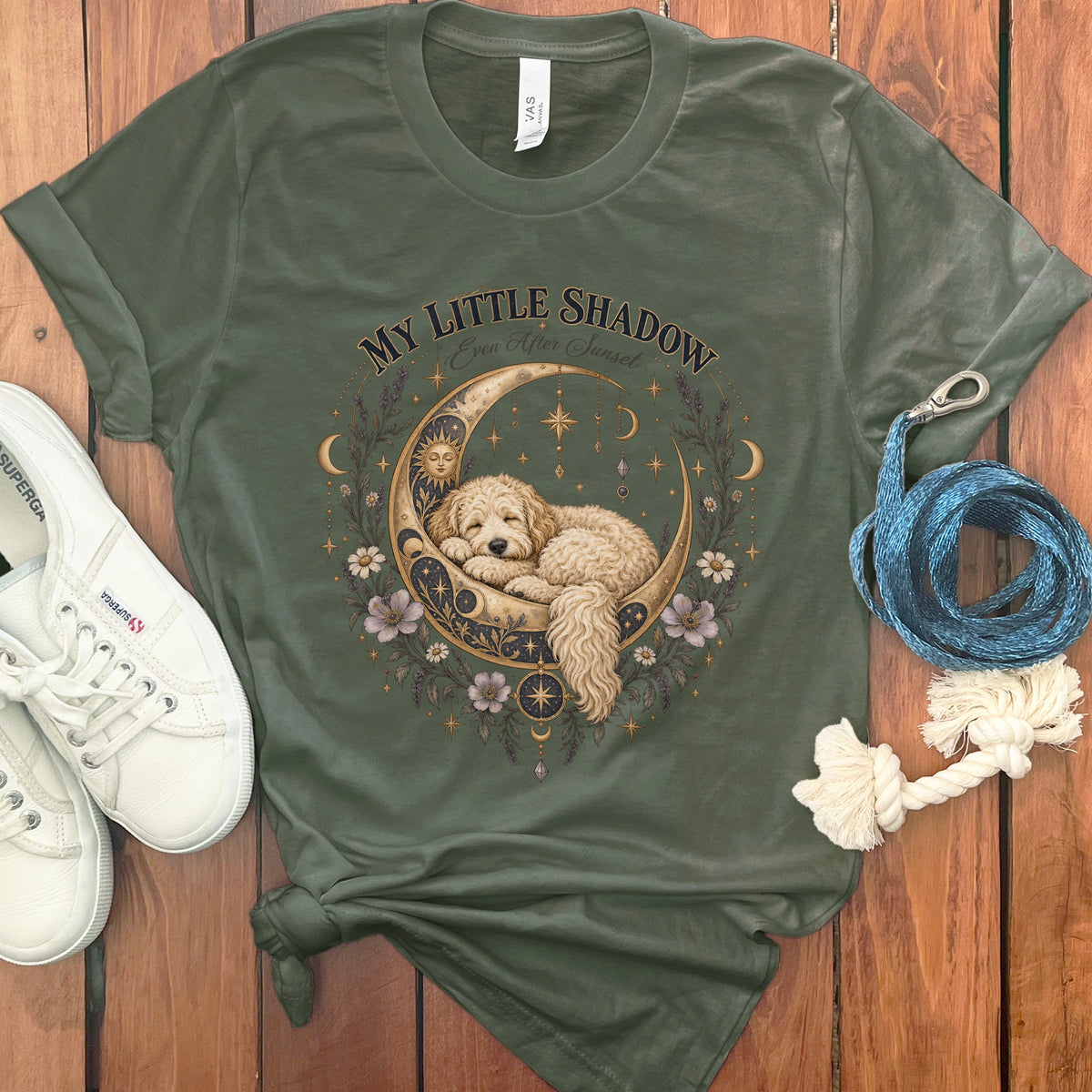 Green t-shirt with "MY LITTLE SHADOW Even After Sunset" graphic of dog on moon.