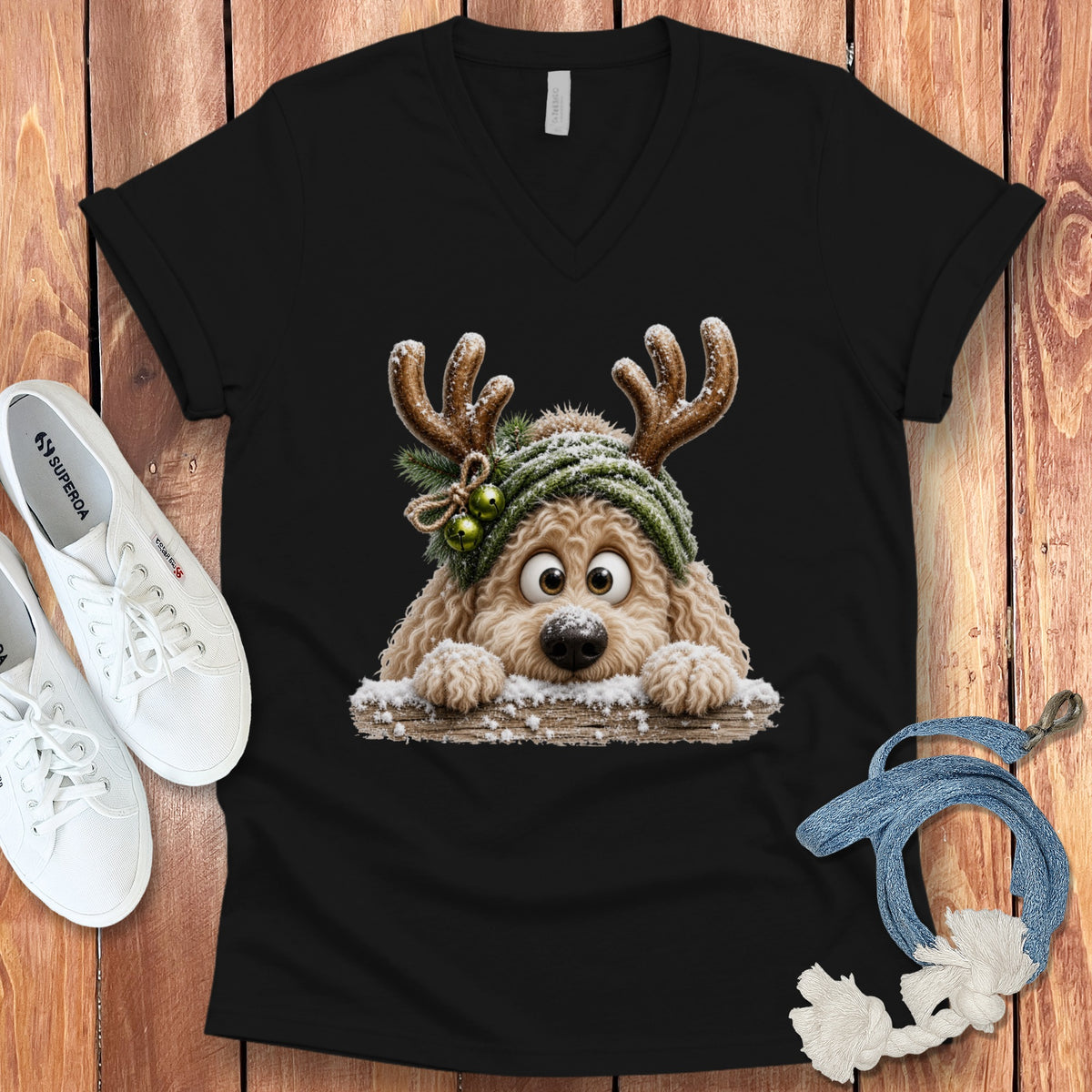 Black t-shirt with a cute cartoon dog wearing antlers and a beanie.