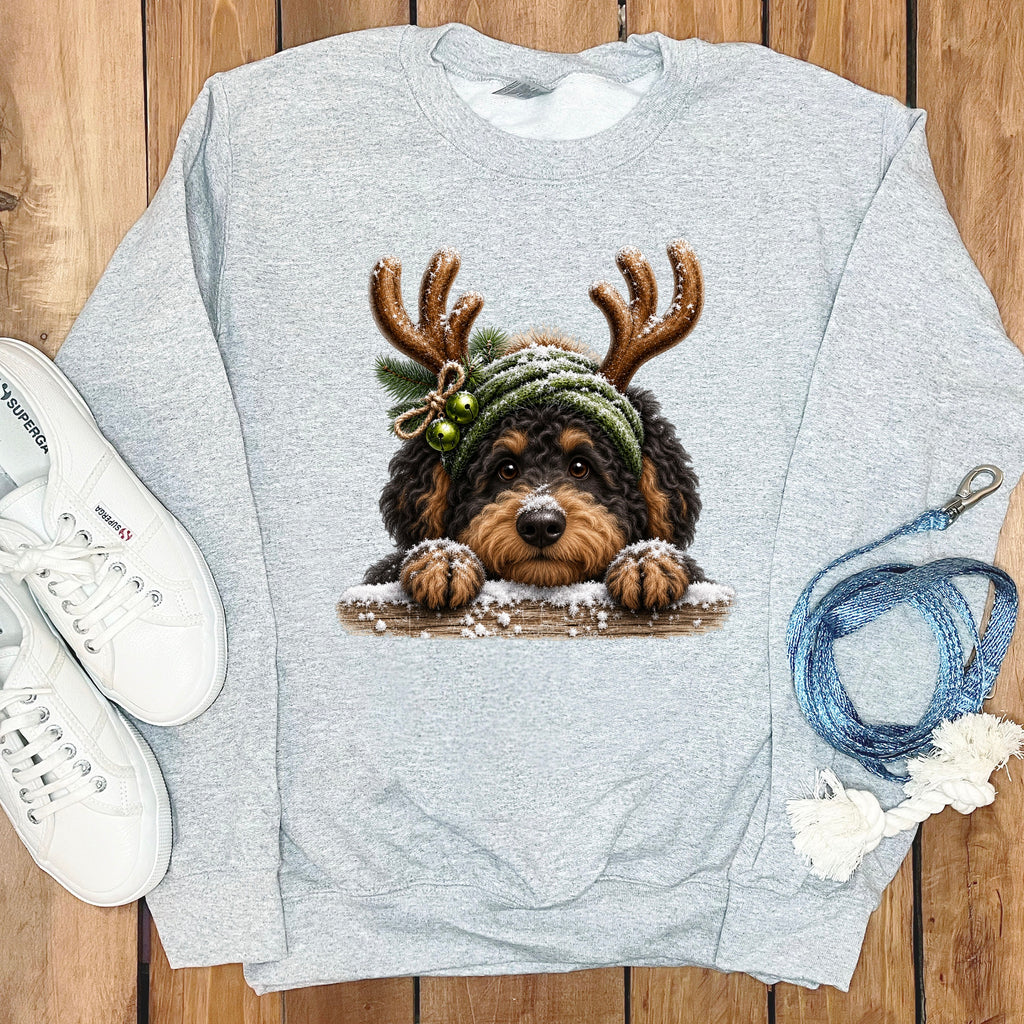 Light grey sweatshirt with a Christmas-themed doodle dog wearing antlers and bells.