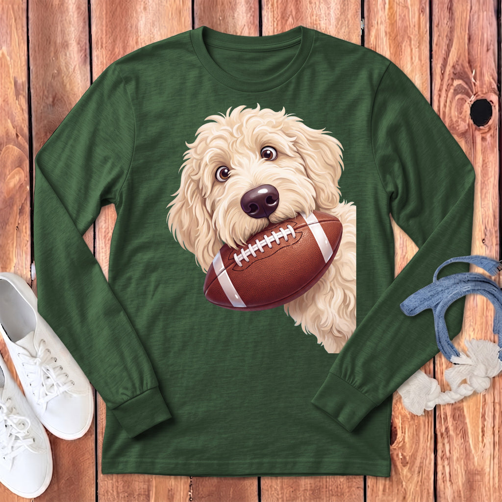 Green long-sleeve shirt with a white doodle dog holding a football.