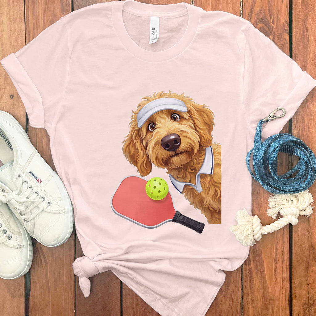 Golden Goldendoodle Pickleball Player T-Shirt in Soft Pink / S by Puppy Jo