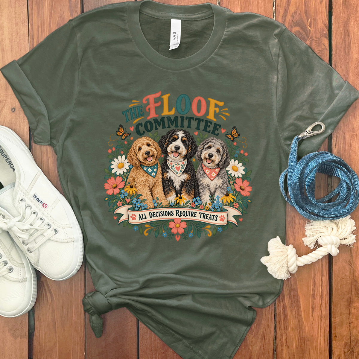 Olive t-shirt with "The Floof Committee" and three dogs; text reads "All Decisions Require Treats."