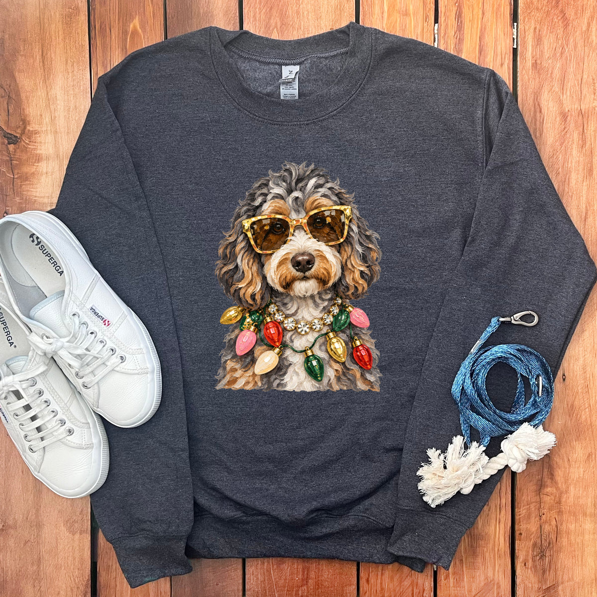 Dark grey sweatshirt with a dog wearing sunglasses and Christmas lights.