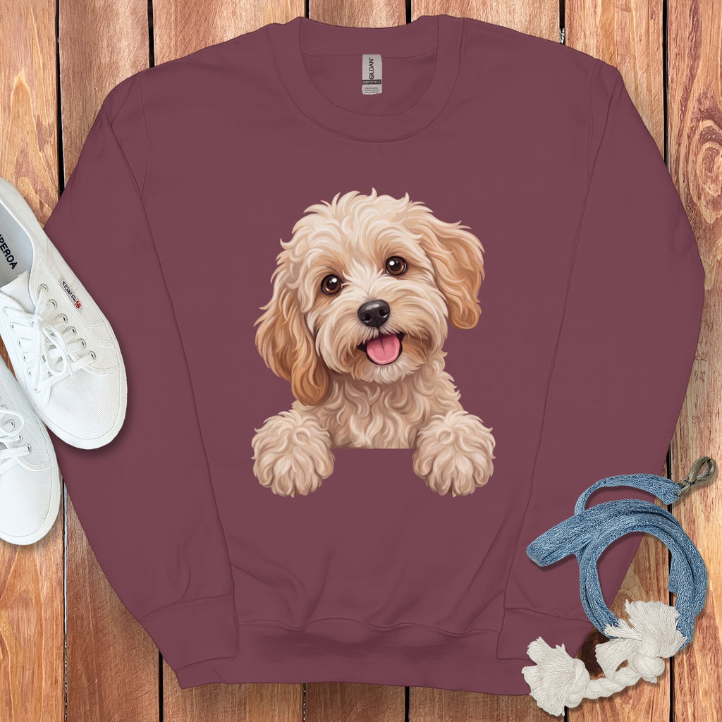 Maroon sweatshirt with a cute dog illustration and white sneakers.
