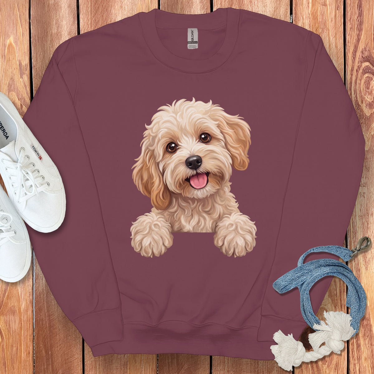 Maroon sweatshirt with a cute dog illustration and white sneakers.