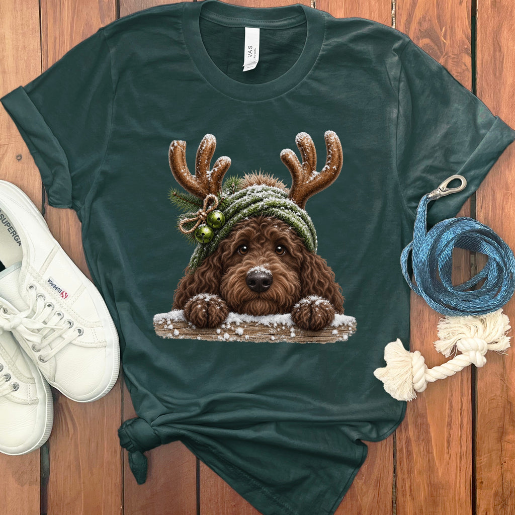 Dark green t-shirt with a graphic of a brown dog wearing reindeer antlers.