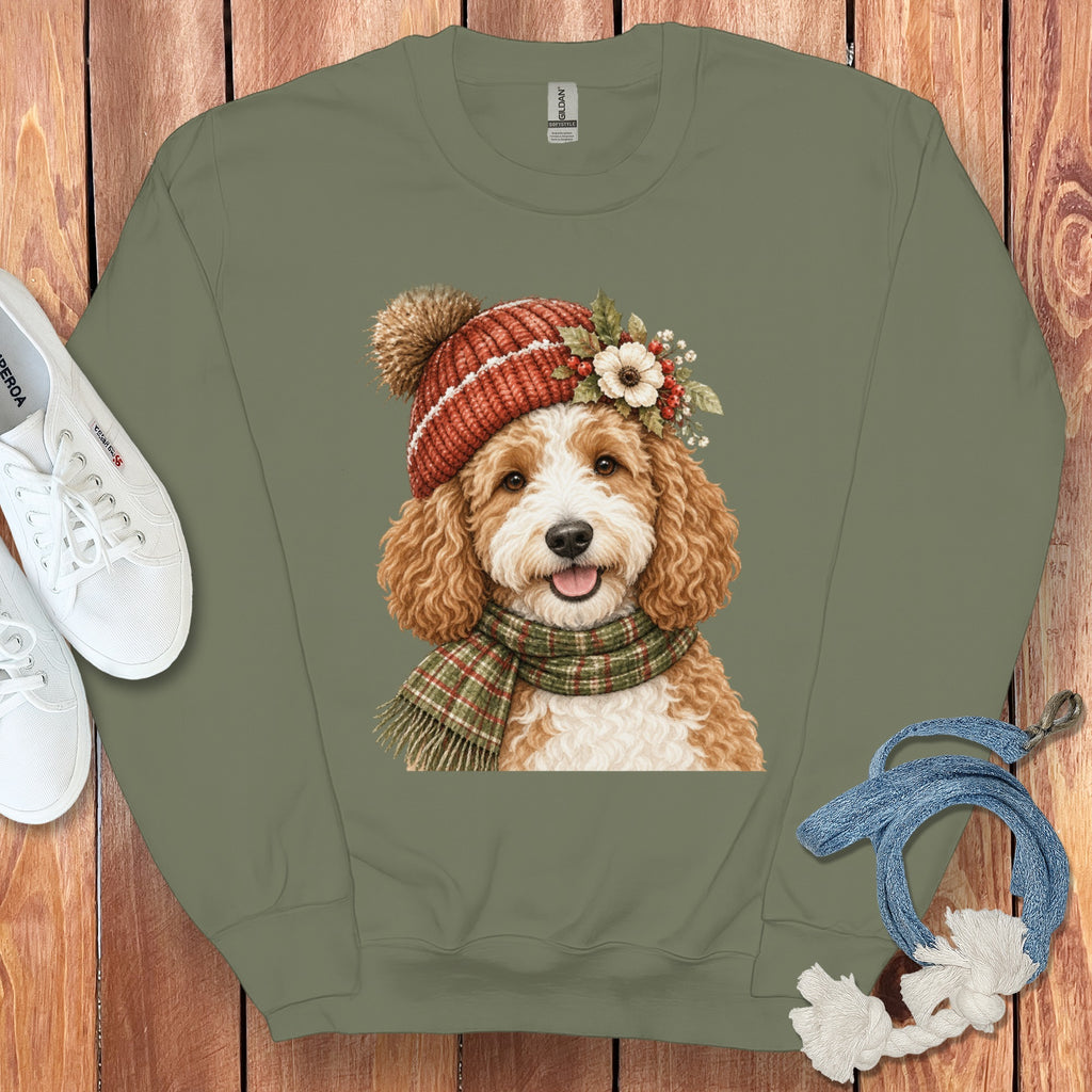 Crewneck sweatshirt featuring a watercolor print of a dog wearing a winter hat and scarf.
