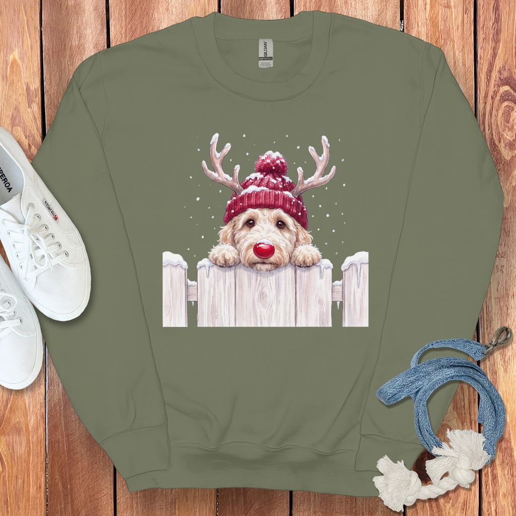 Crewneck sweatshirt with a doodle dog wearing a red beanie and antlers.