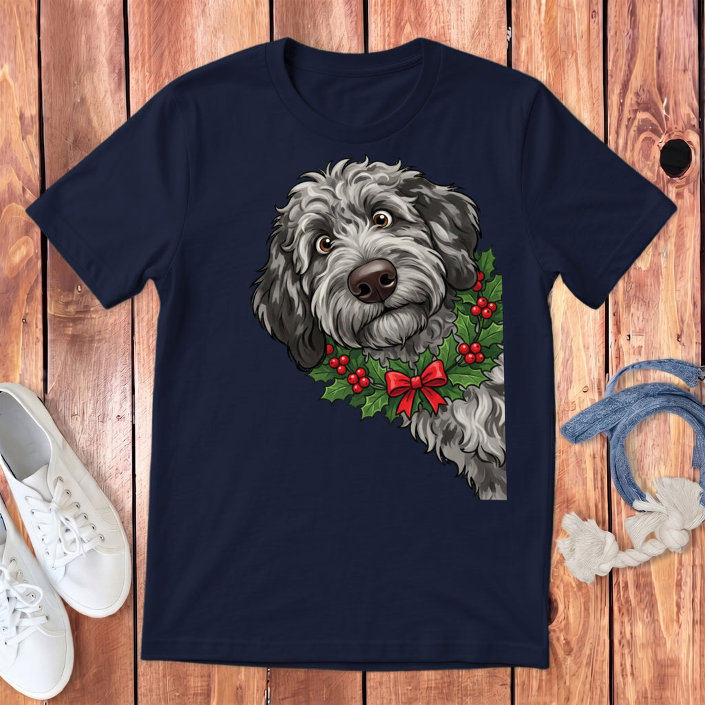 Dark blue t-shirt with a cartoon dog wearing a holly wreath and red bow.