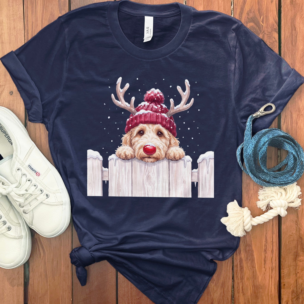 Navy t-shirt with a doodle dog wearing a red beanie and antlers.