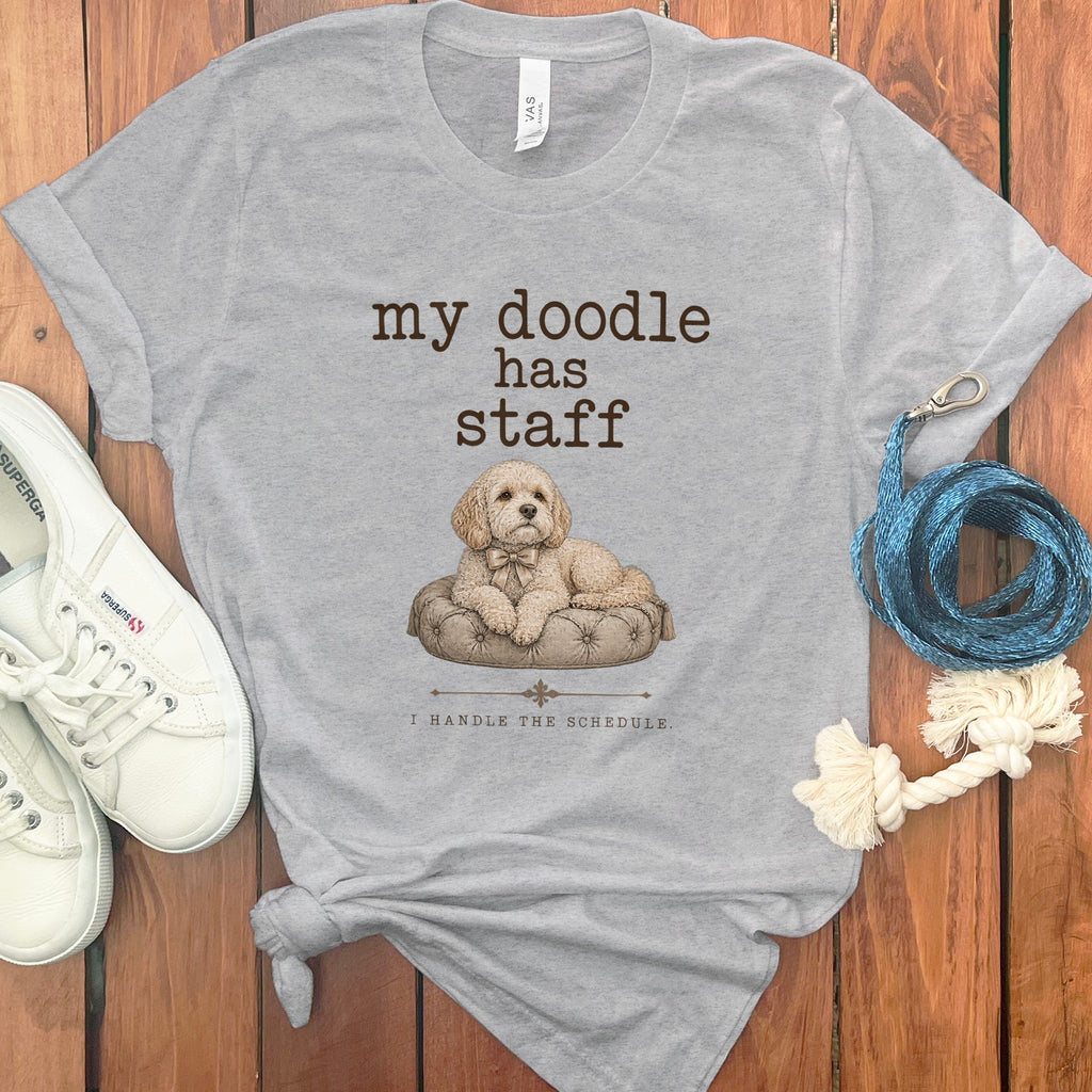 Grey t-shirt with text "my doodle has staff" and drawing of a dog.