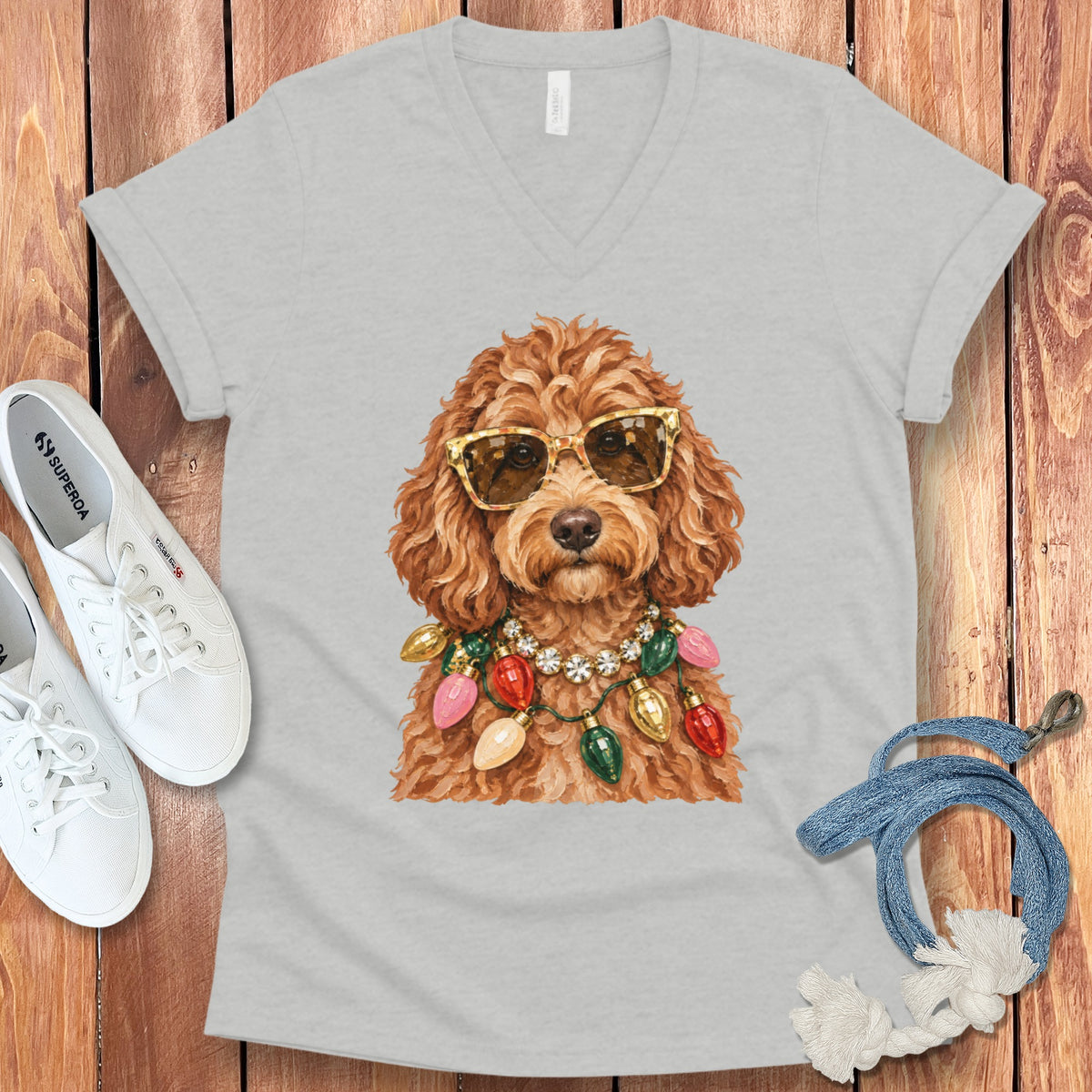 Light grey t-shirt with a dog wearing sunglasses and a Christmas light necklace.
