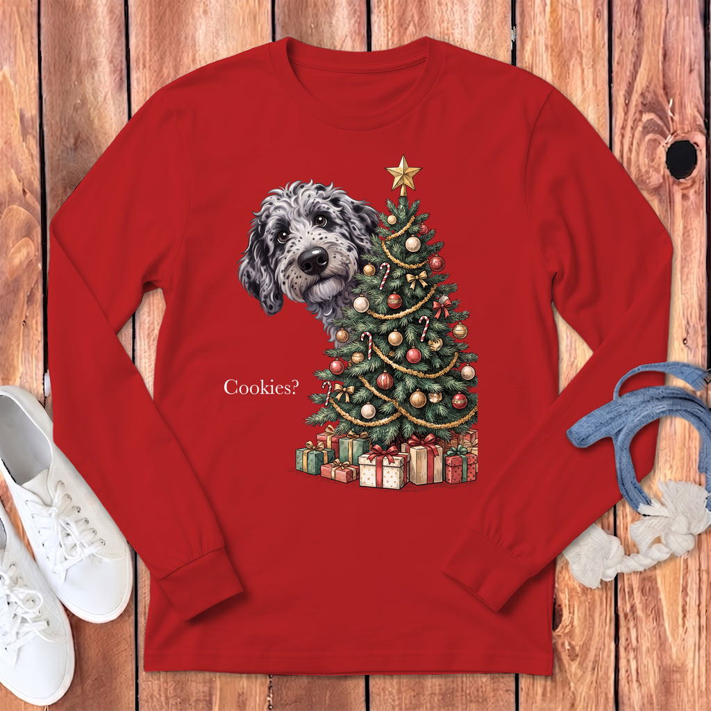 Dog peeking behind a Christmas tree with presents and "Cookies?" text.