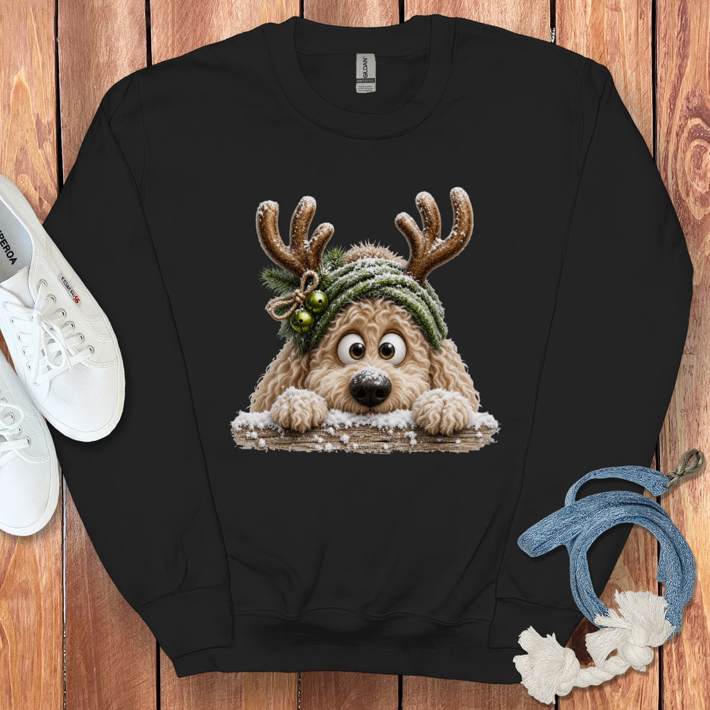Black sweatshirt with a cartoon dog wearing antlers and a green beanie.