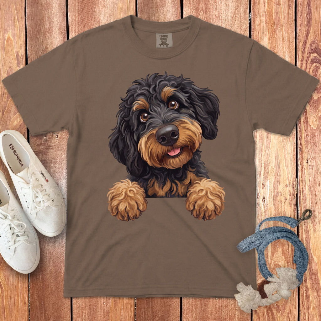 Brown t-shirt with a black and tan dog graphic, white Superga shoes, and rope toy.