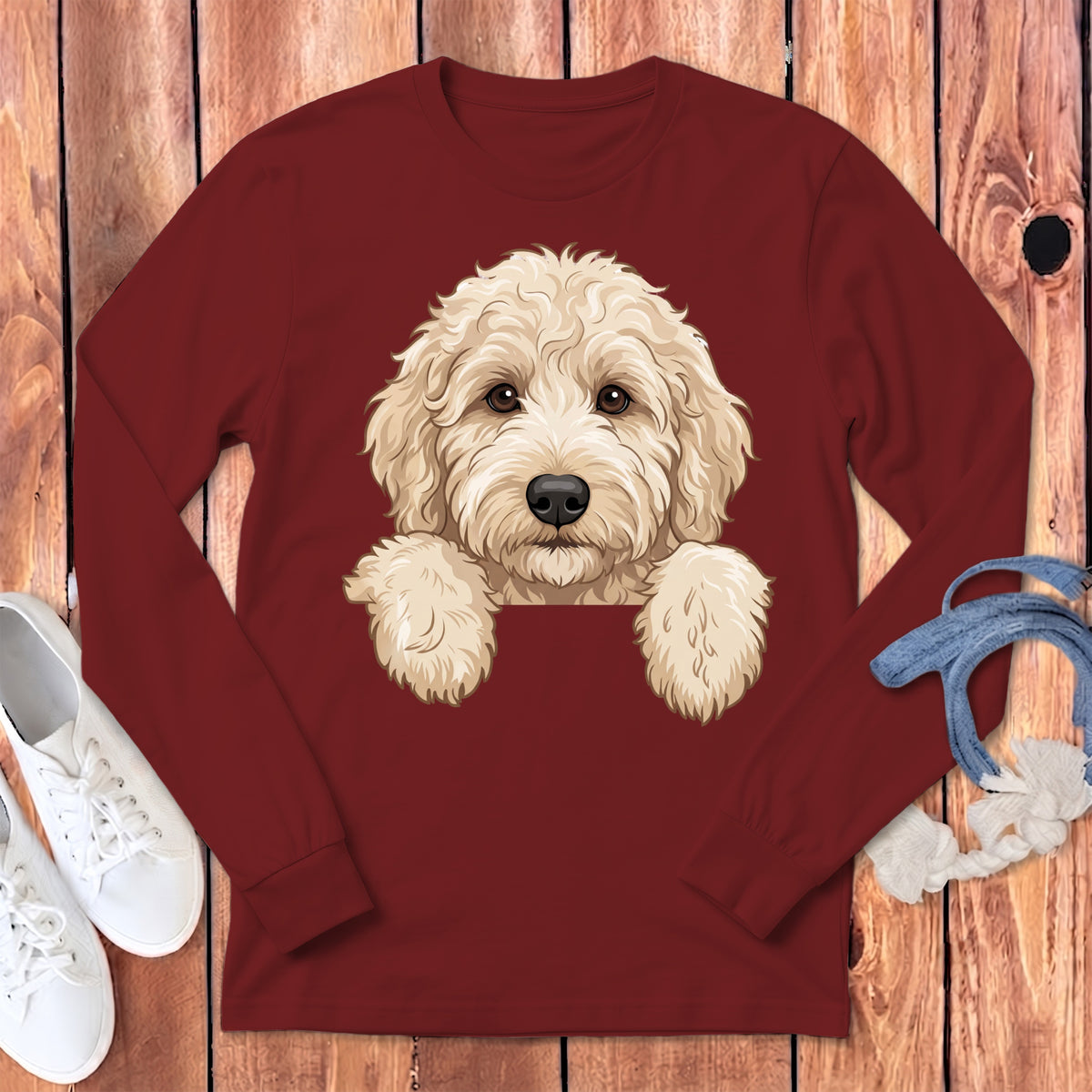 Maroon long-sleeve shirt with a doodle dog illustration peeking over the collar.