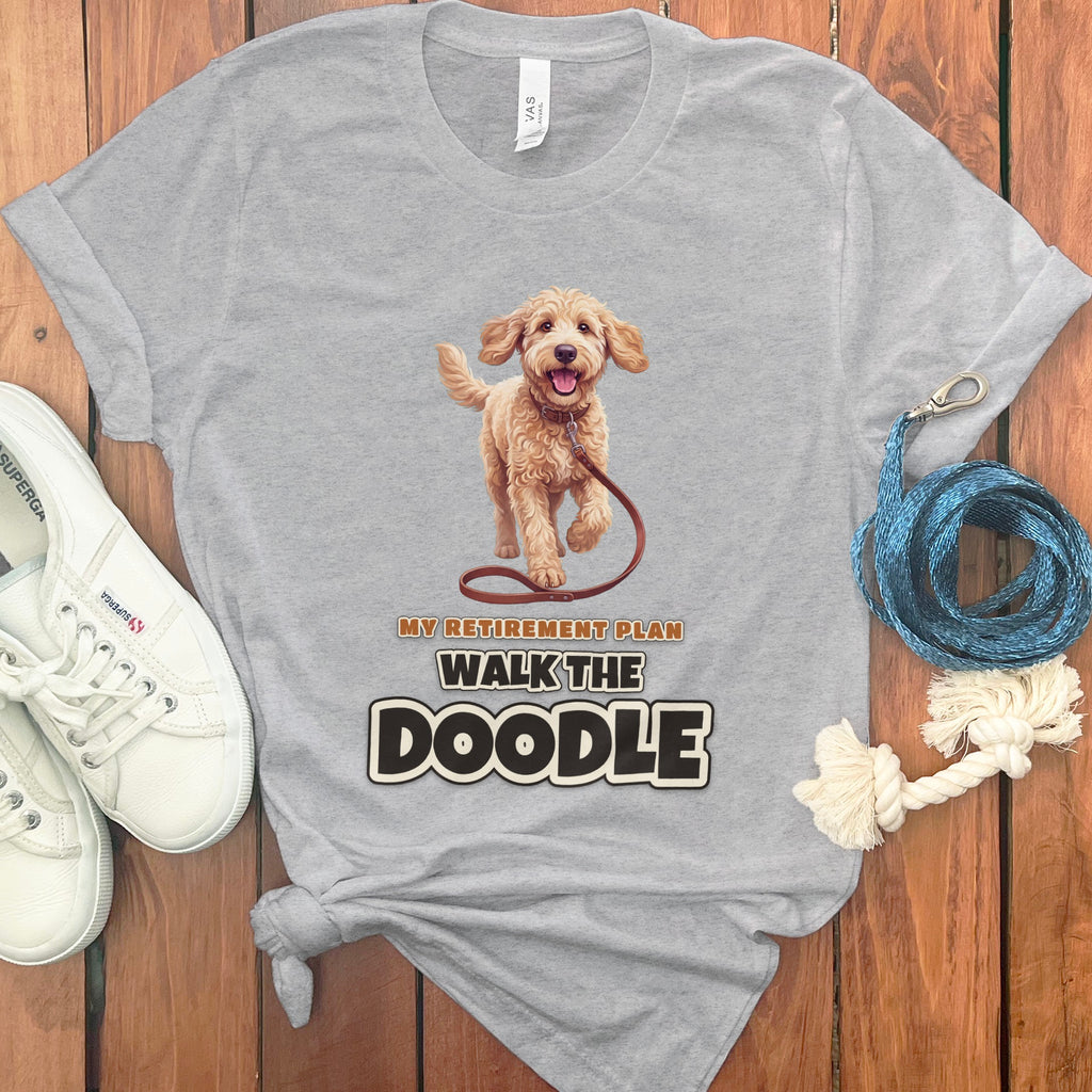 Grey t-shirt with a doodle dog illustration and text: "My Retirement Plan Walk the Doodle".