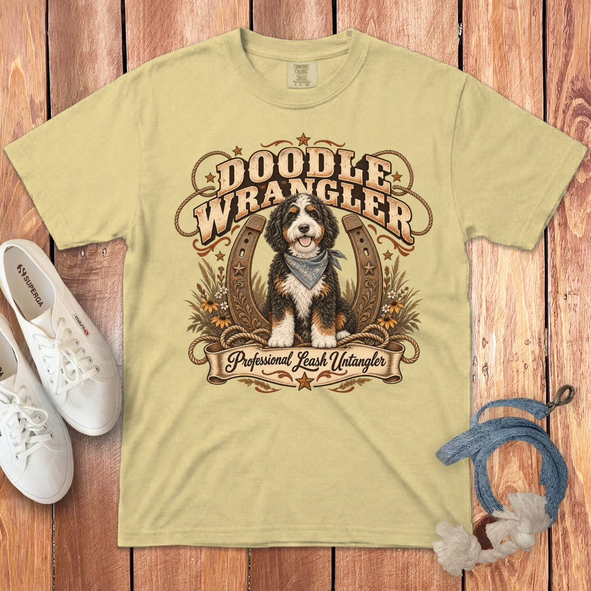 Light yellow t-shirt with "Doodle Wrangler" and "Professional Leash Untangler" text featuring a dog.