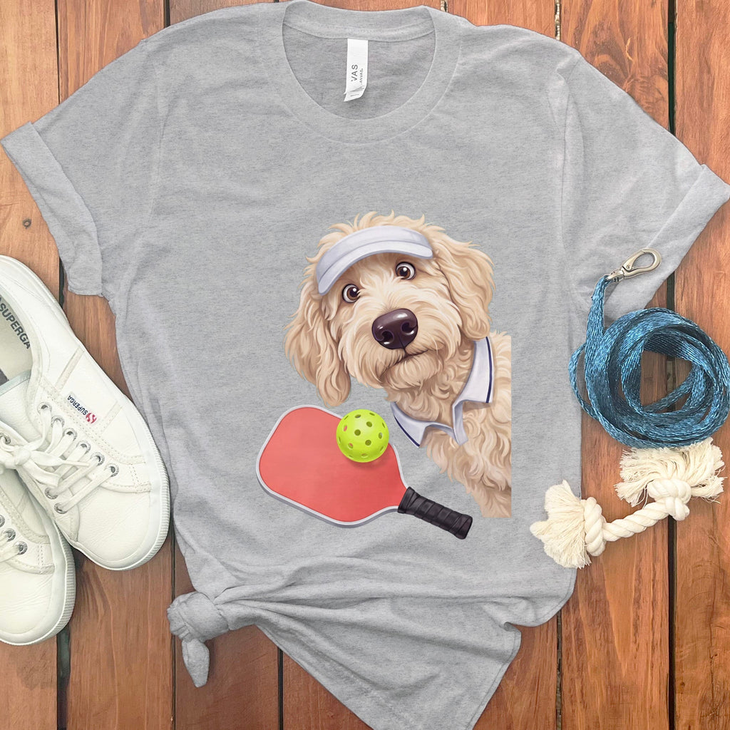 Cream Goldendoodle Pickleball Player T-Shirt in Athletic Heather / S by Puppy Jo