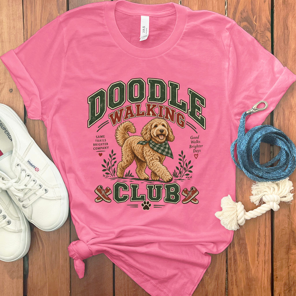 Pink t-shirt with "Doodle Walking Club" text and a goldendoodle graphic.