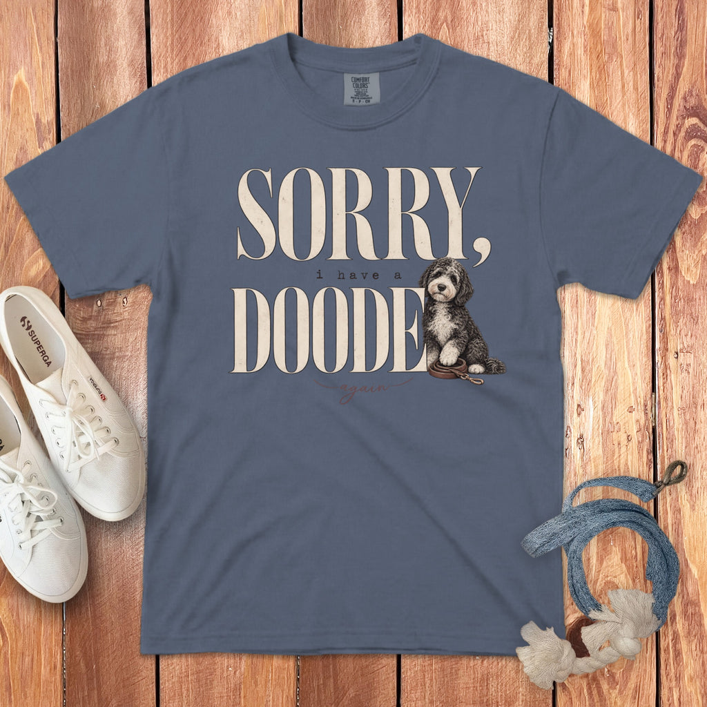Slate blue crewneck t-shirt with the text "SORRY, I HAVE A DOODLE" and an illustration of a doodle puppy.