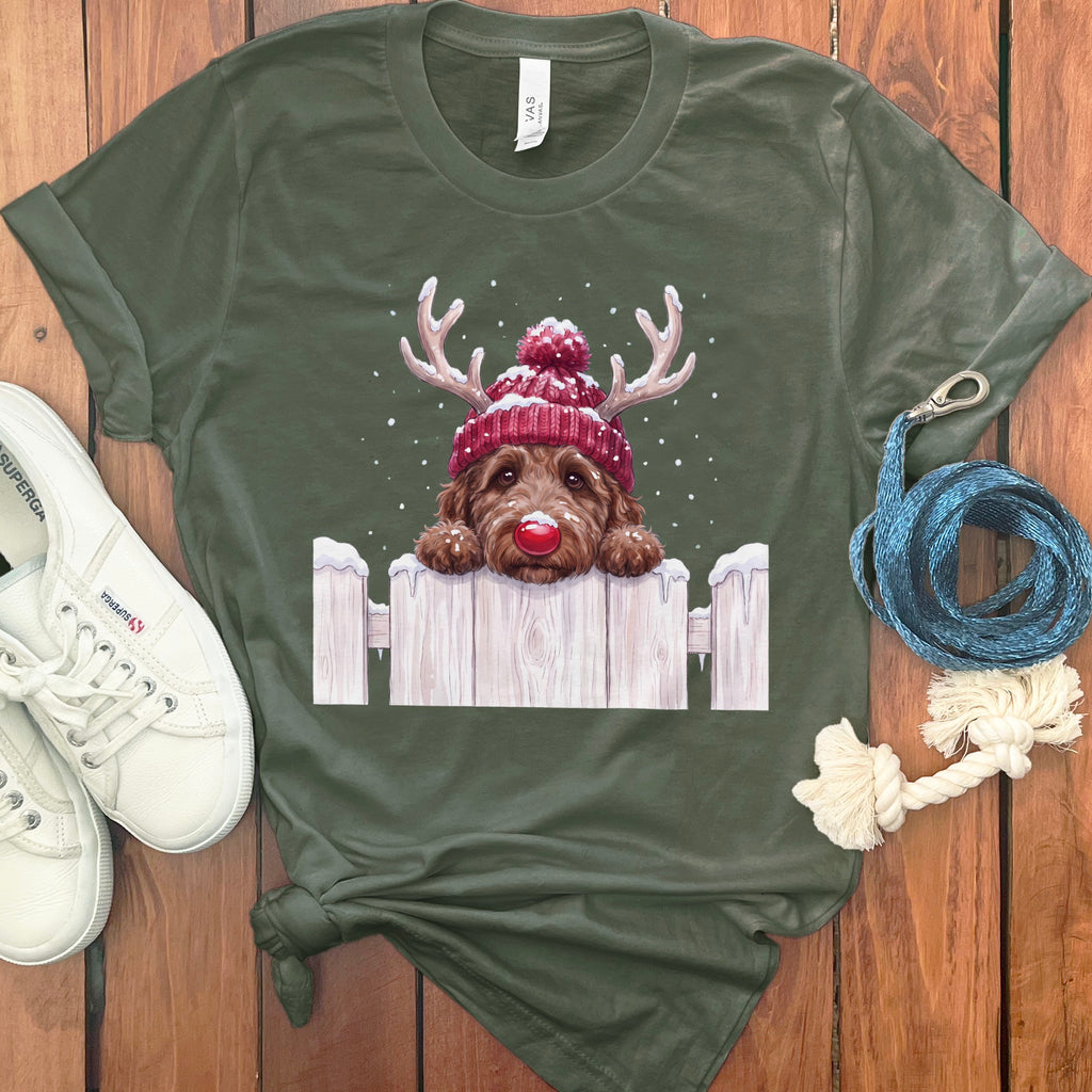 Green t-shirt with a doodle dog wearing a Santa hat and reindeer antlers.