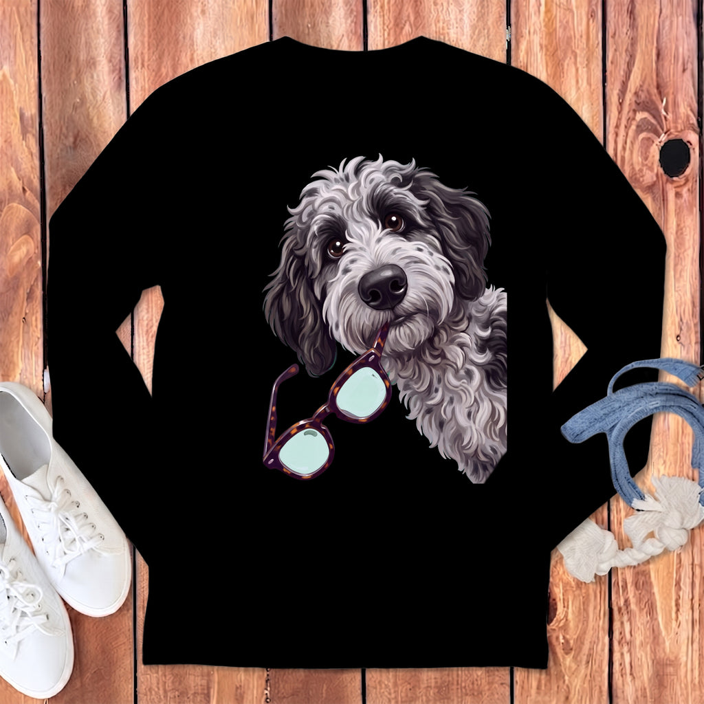 Black long-sleeve t-shirt featuring a graphic of a fluffy dog holding glasses in its mouth.