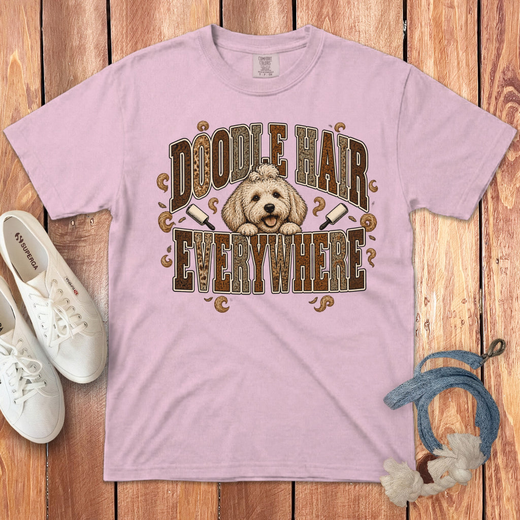 Light pink t-shirt with a Doodle Hair Everywhere graphic featuring a fluffy doodle dog.