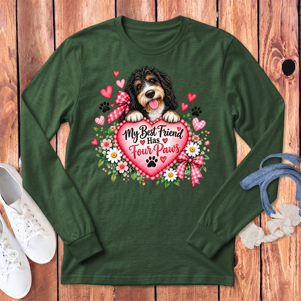 Dark green long-sleeve t-shirt with a graphic of a puppy, a pink heart, and flowers.
