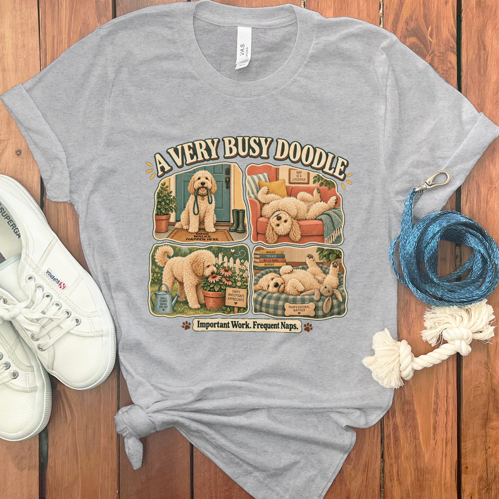 T-shirt with four panels of a doodle dog, saying "A Very Busy Doodle".