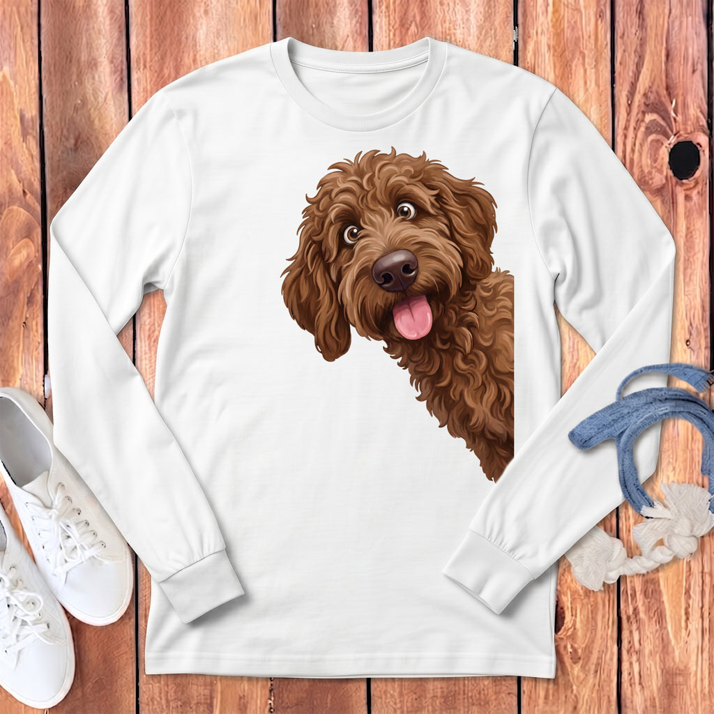White long-sleeved t-shirt with a playful brown doodle dog graphic peeking from the side.