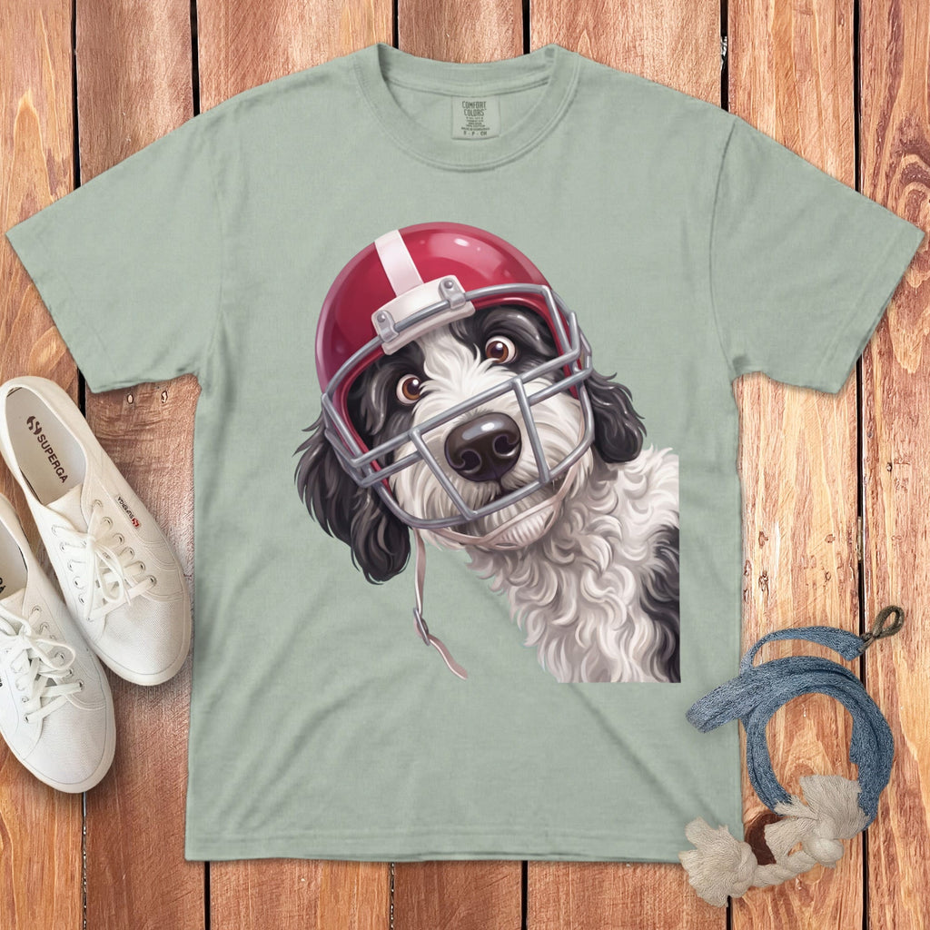 A dog wearing a red football helmet looks to the side.