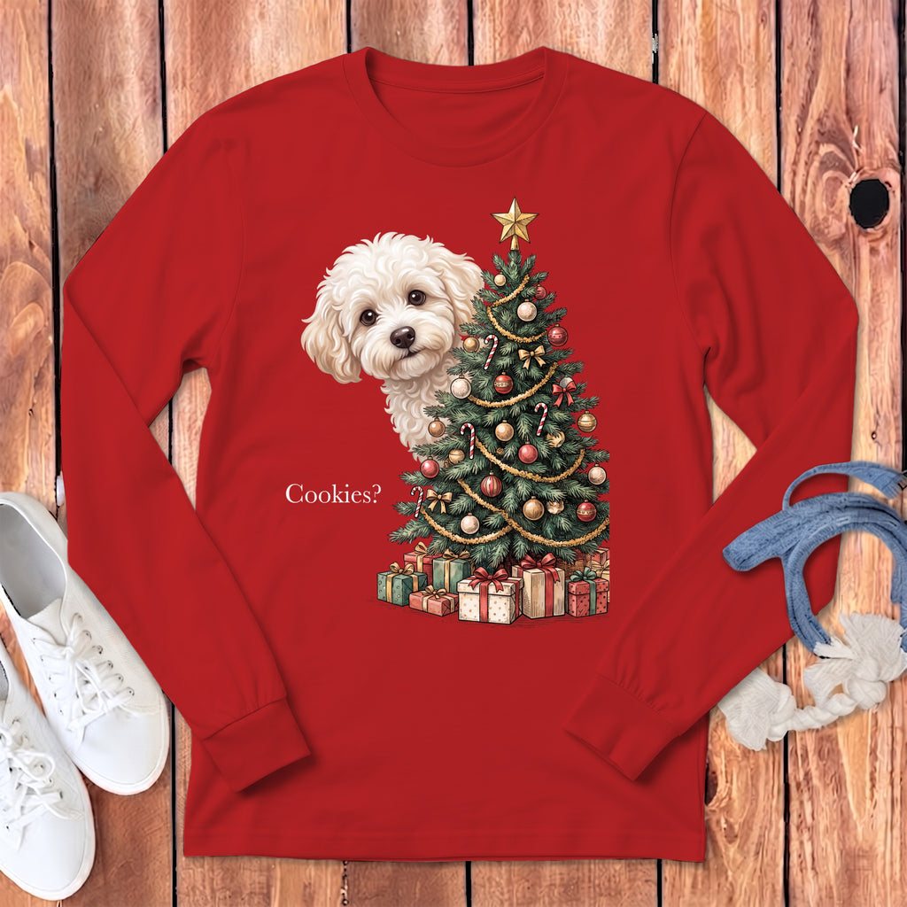 Fluffy white dog peeks from behind a decorated Christmas tree with presents and "Cookies?" text.